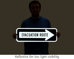 Reflective evacuation route sign
