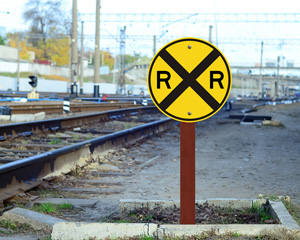 Round railroad crossing sign